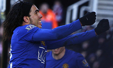 Carlos Tevez celebrates his winning goal